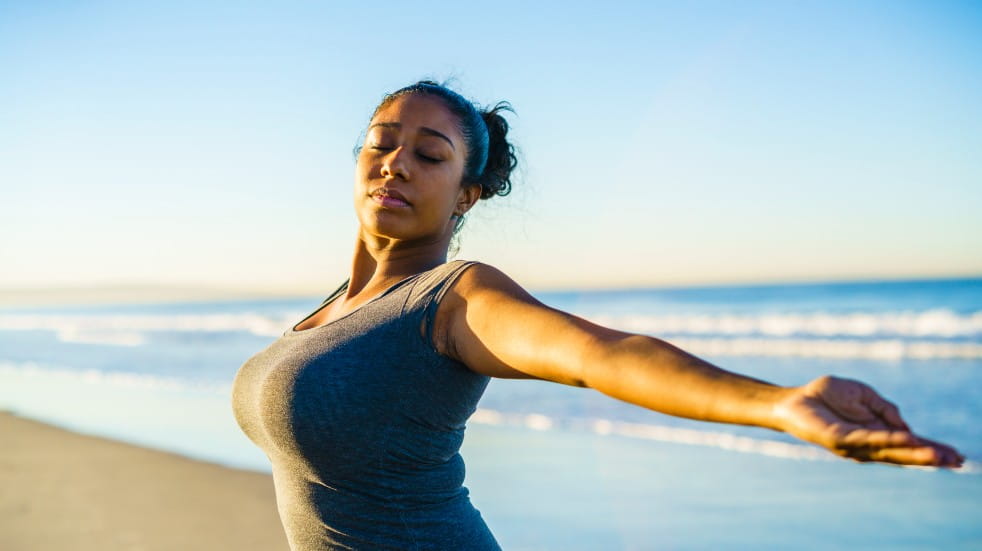 woman doing chest stretch